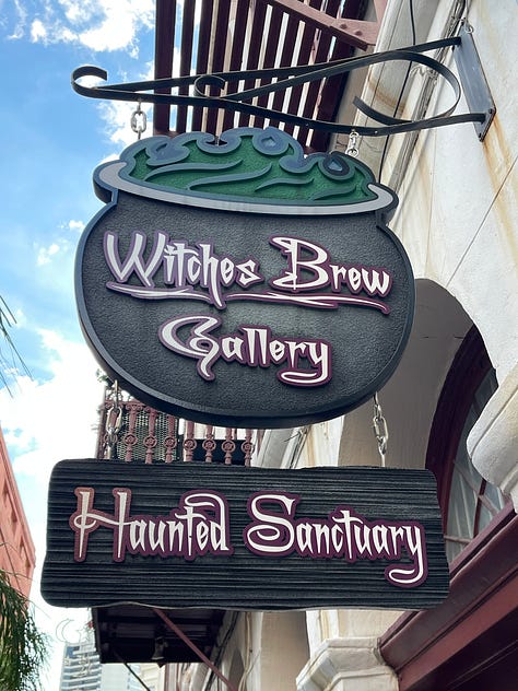 Images of New Orleans' French Quarter + swamp, including iconic balconies dripping in ferns, a swamp gator near Slidell, Jordan in front of blue doors, a cemetary and two tarot card spreads.