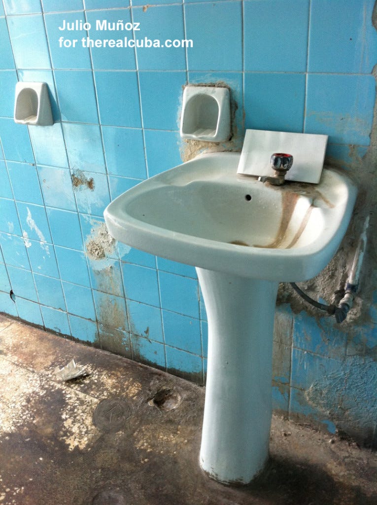 Before you leave the men's room, you are supposed to wash your hands here, except that there is no soap and no water!