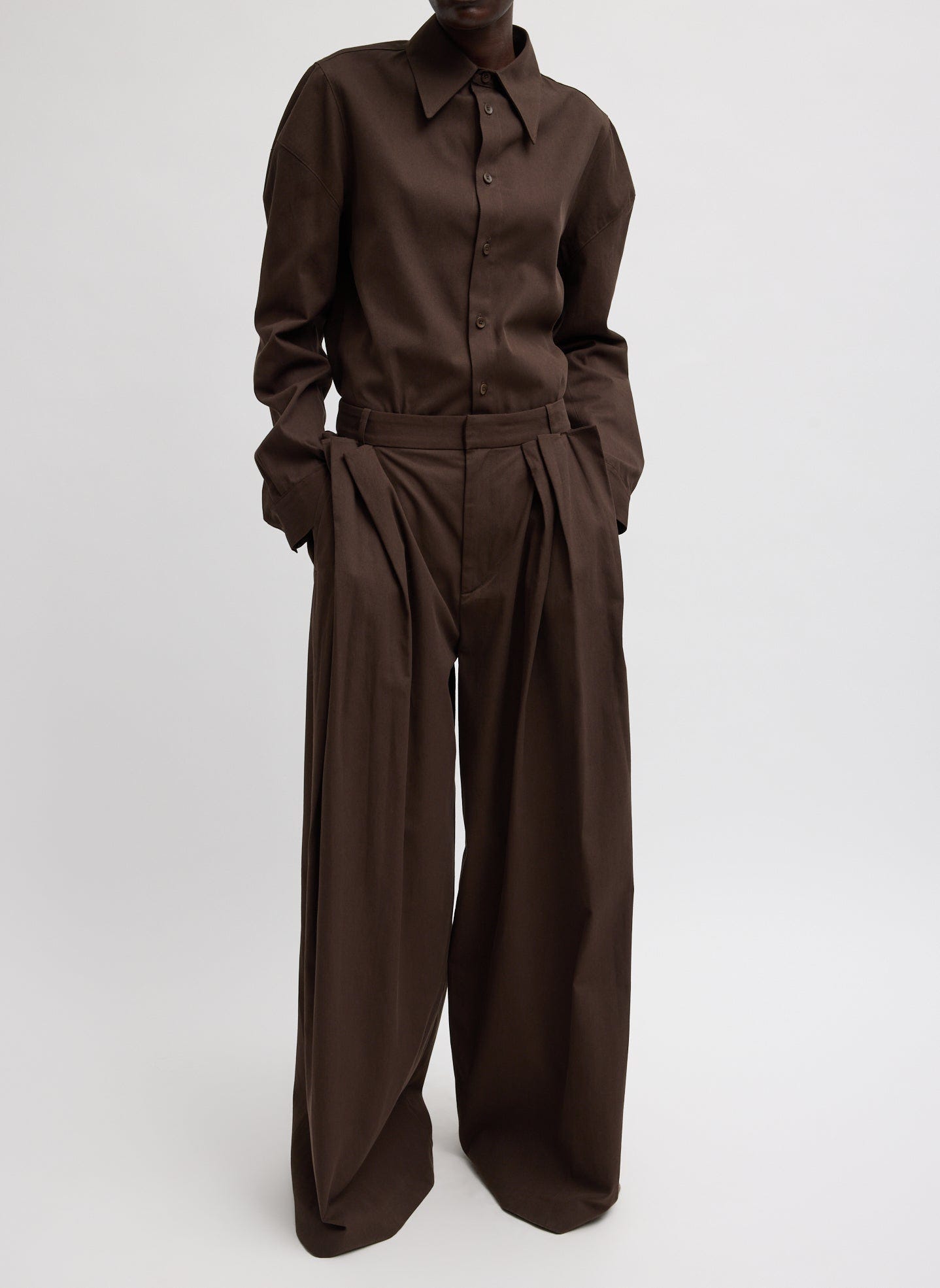 Dark Brown Luxe Spring Twill Tucked Pleated Wide Leg Trouser - full look, front view on model Dark Brown Luxe Spring Twill Tucked Pleated Wide Leg Trouser - full look, front view on model