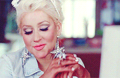 A gif of Christina Aguilera on the computer A gif of Christina Aguilera on the computer