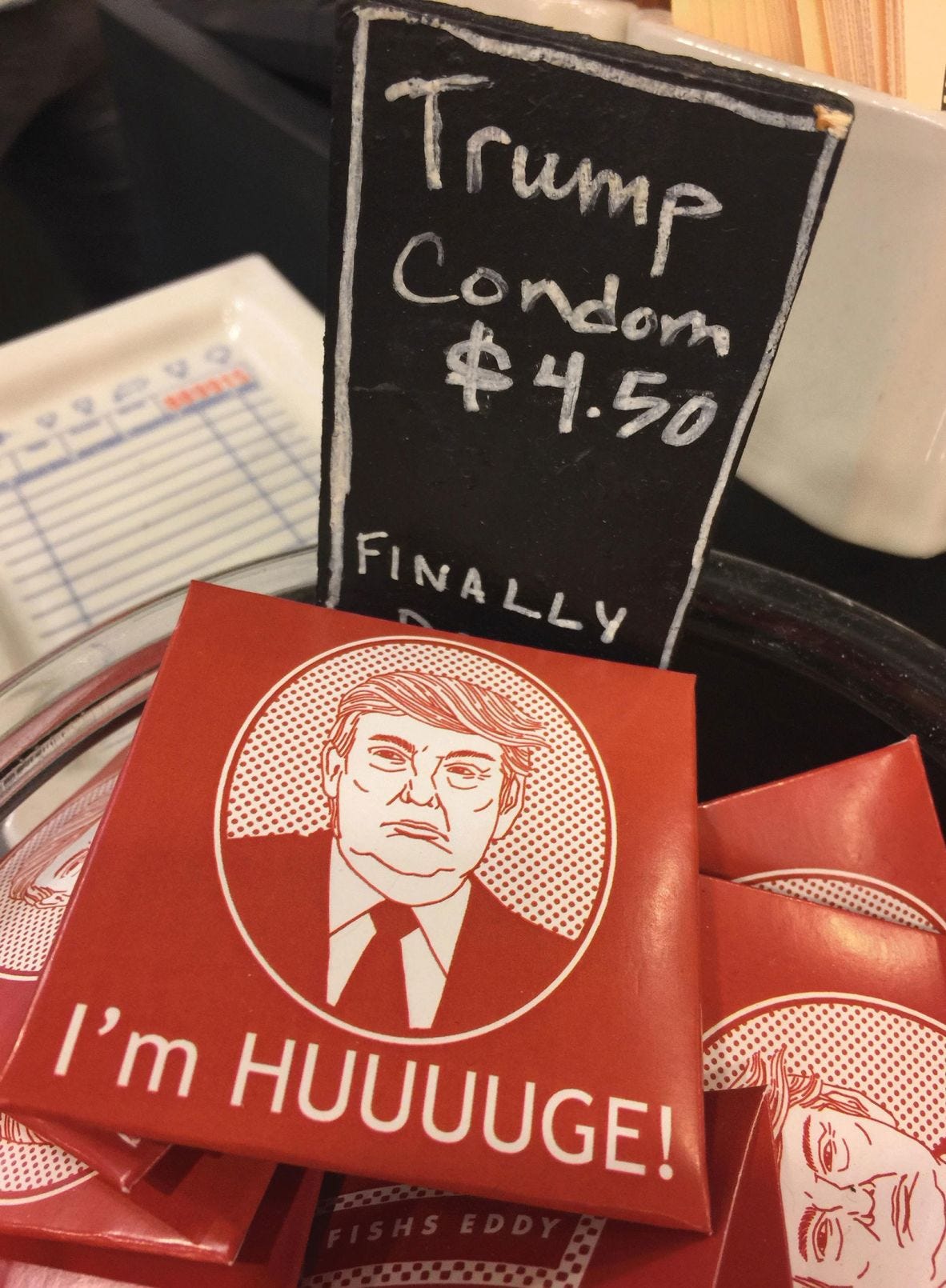 A novelty condom featuring a caricature of Donald Trump's face.