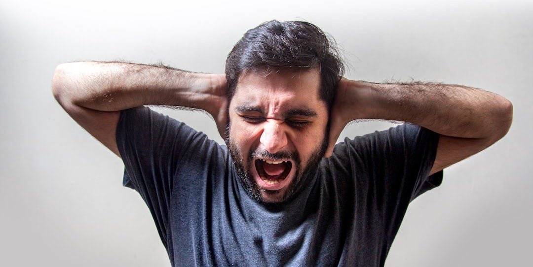 man in black crew neck t-shirt