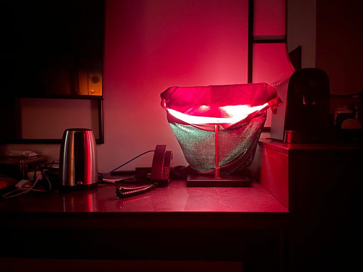 Red t-shirt on left, amber clip on light on right