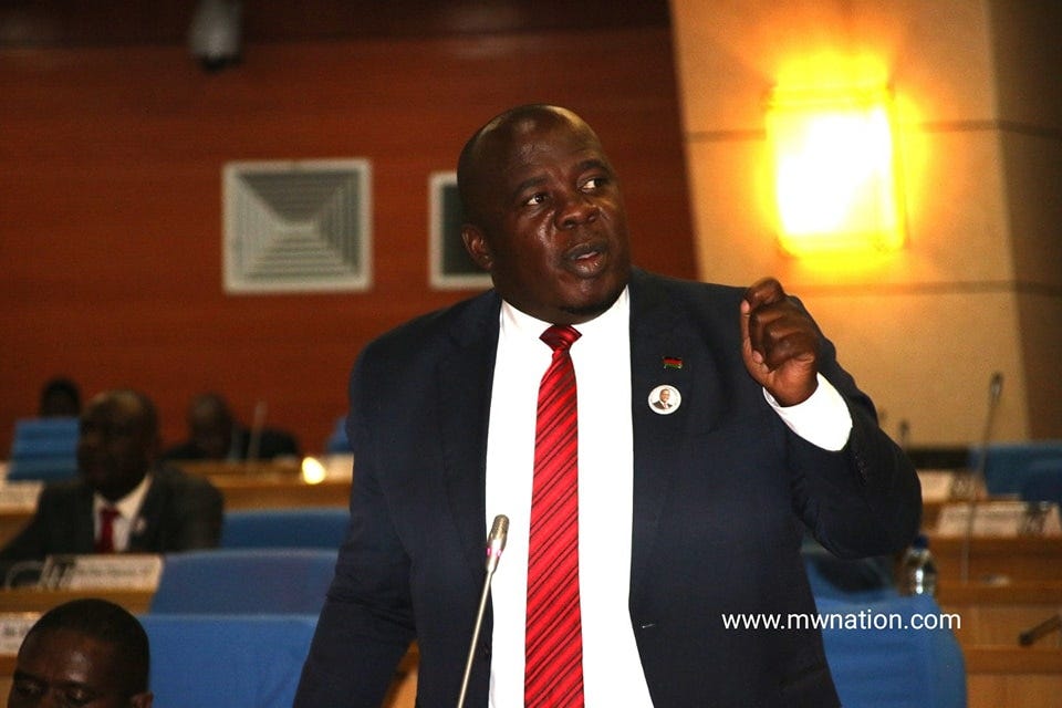 May be an image of 3 people, dais and text