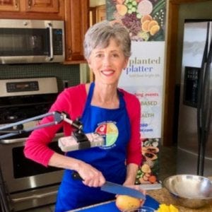 deb czech in her kitchen making plant-based food