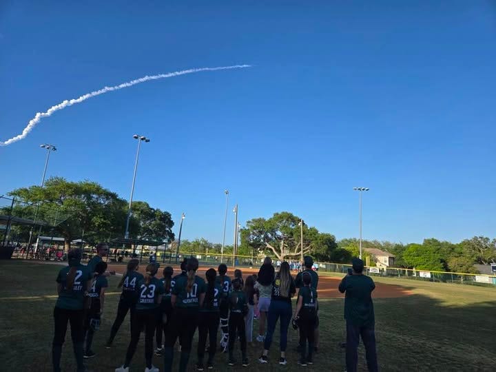 May be an image of blimp and text