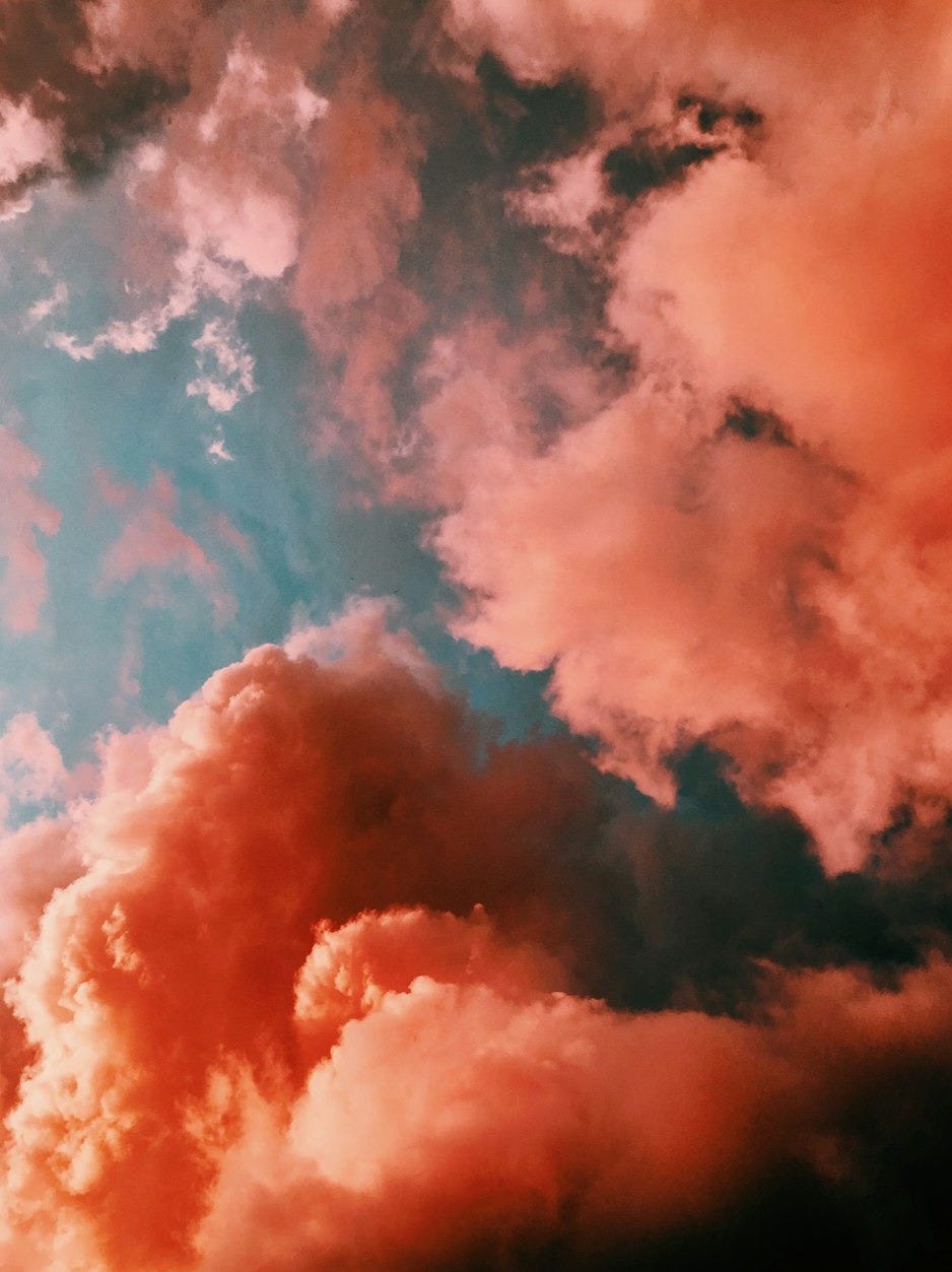 orange smoke on blue background