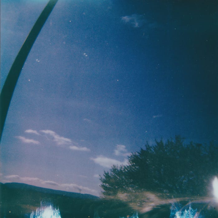 Sky reflection in the van window / Post show group shot (photo by Stephanie Bowman)