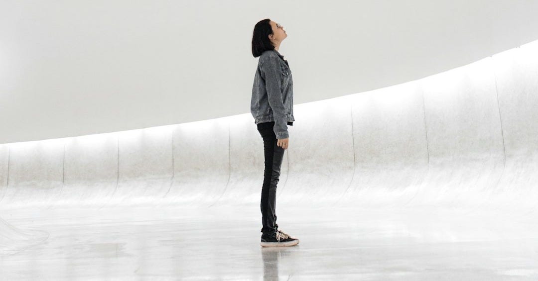 woman standing on ice
