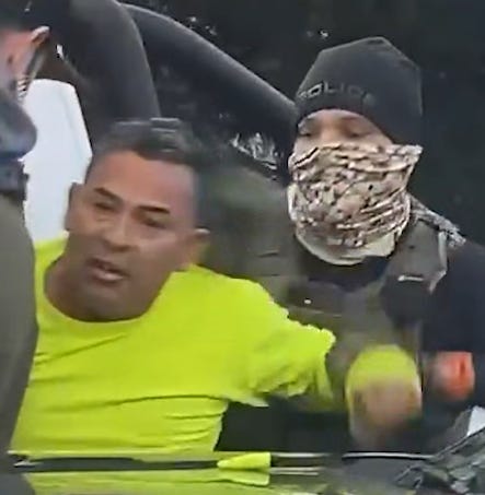 ICE Agents pulled Atilio Portillo from his truck at gunpoint and handcuffed him as he protested that he was a US Citizen. (Frame grab from video released by Siembra NC)