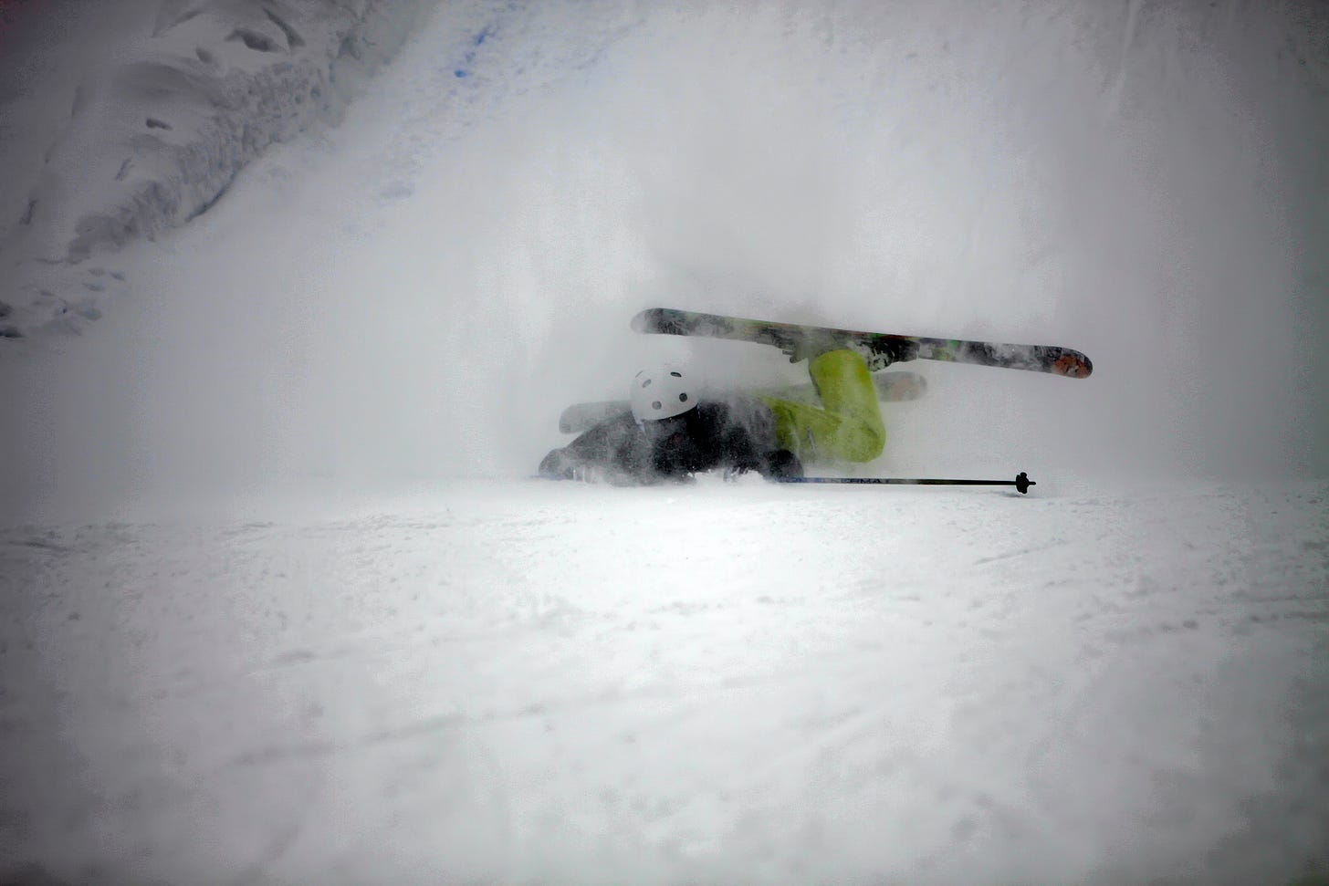 skier falling over skier falling over
