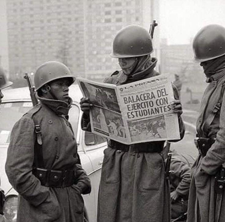 Mexican dispached soldiers on CDMX reading a newspaper about the tlatelolco tragedy caused by the order of the intime president Gustavo Díaz Ordaz in order of give the country a good image for the olimpic games,1968