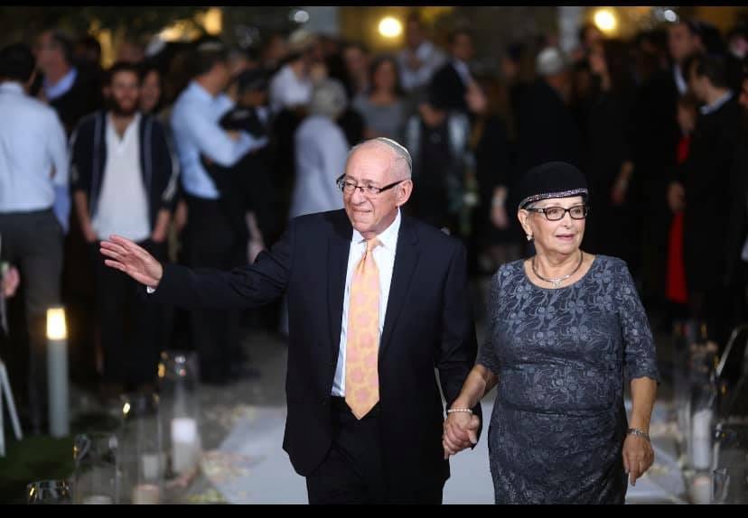 May be an image of 2 people, people standing and outerwear