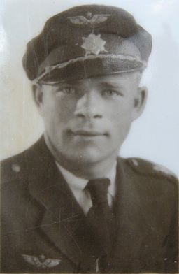 A black and white picture of Josef Bryks with his Czechoslovak Air Force uniform and hat.