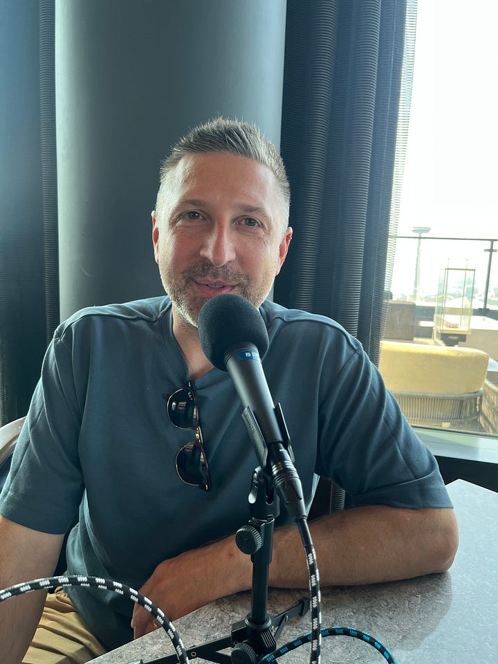 Mat Zinski on the mic in a highrise somewhere in Seattle