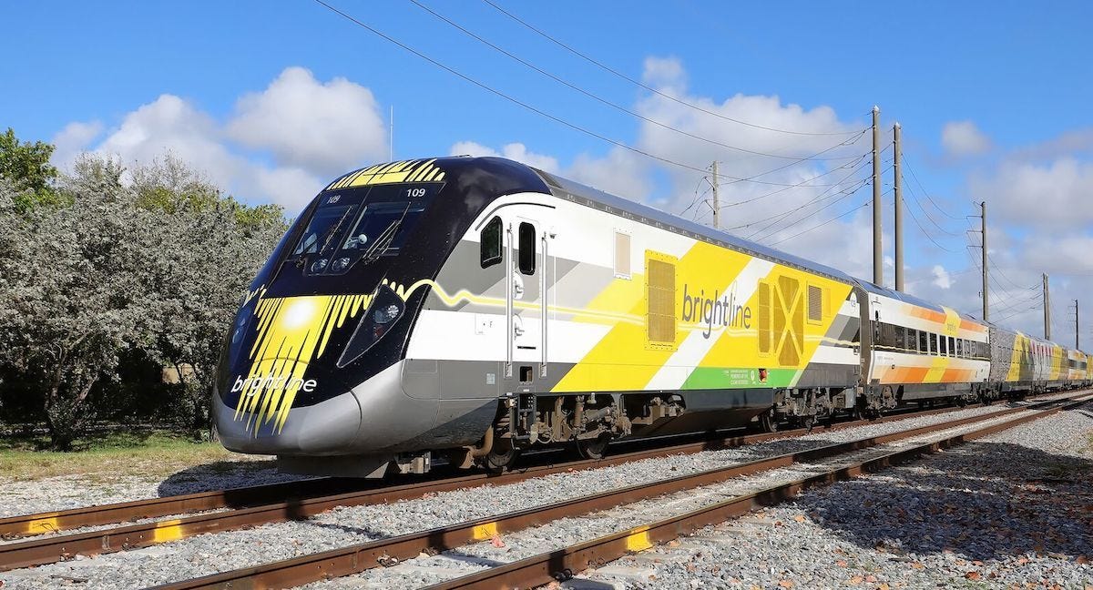 FORT LAUDERDALE, FLORIDA, USA:  Brightline high speed train traveling south towards Miami with power lines in the background, as seen on March 14, 2020. 