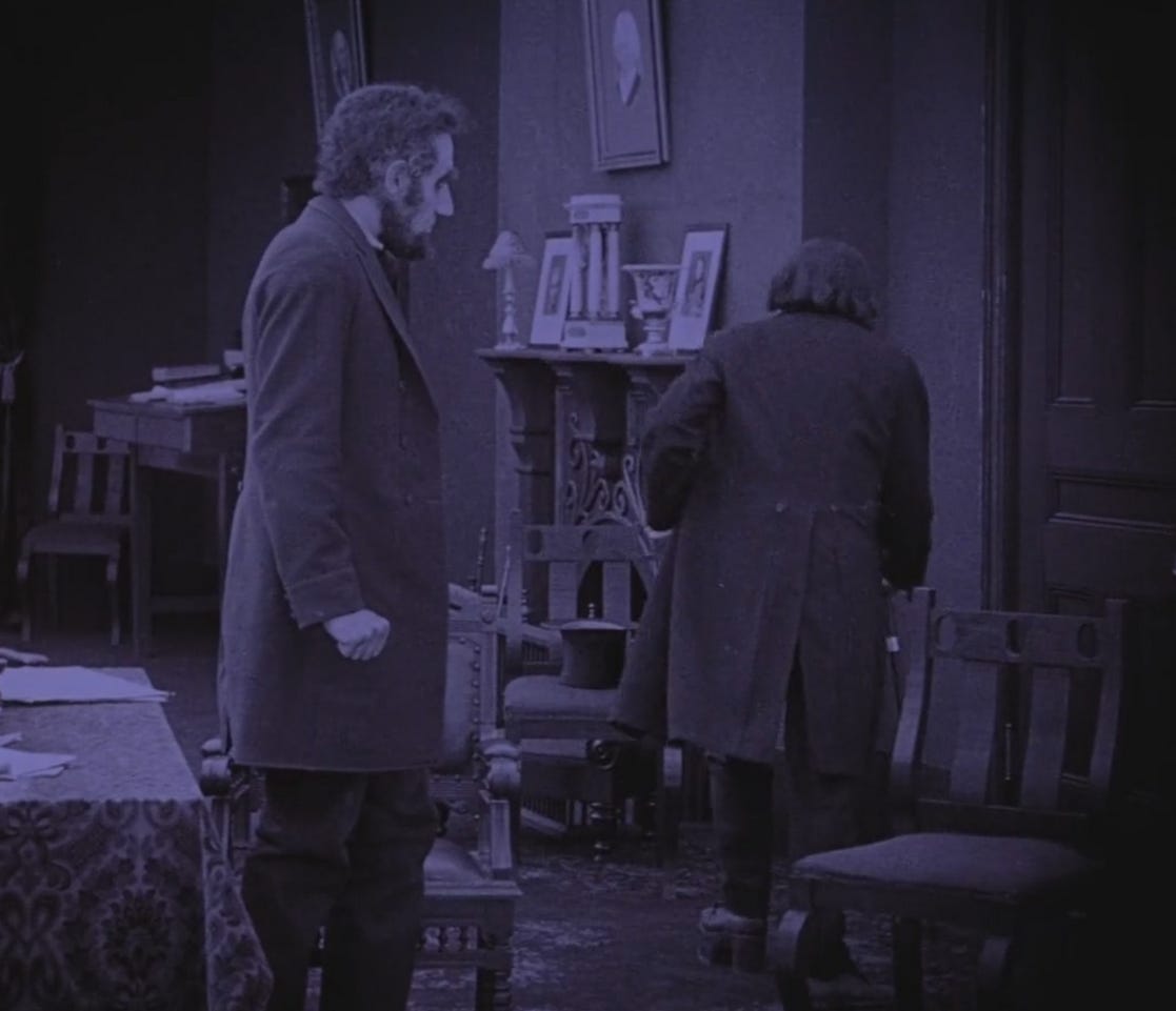 Screen shot from Birth of a Nation. Lincoln watches Stevens walk away on clubbed foot.