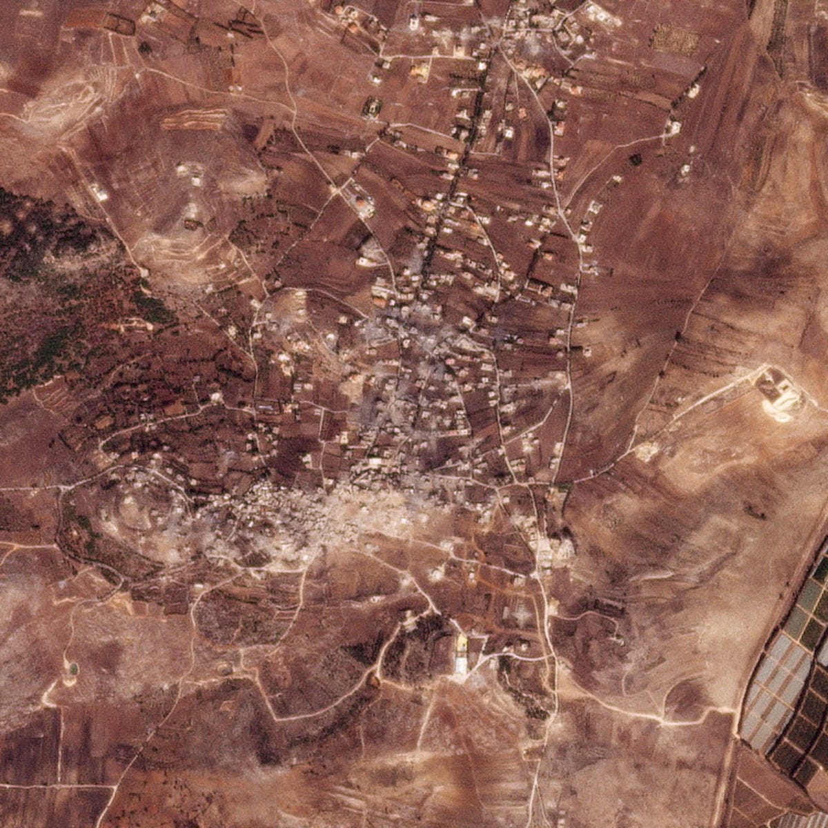 Israeli campaign leaves Lebanese border towns in ruins, satellite images  show | Reuters