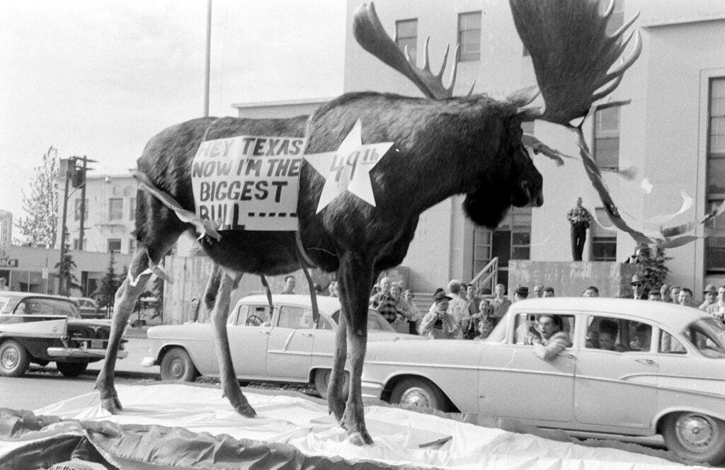 Alaskans jubilantly celebrate the Alaska Statehood Act in 1958, anticipating their official statehood one year later.