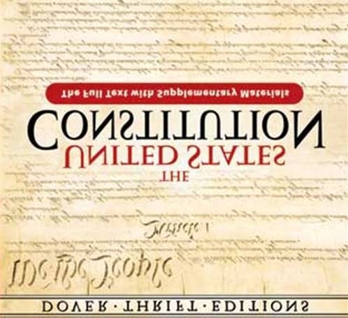The first page of the Constitution of the United States, mirrored and upside down