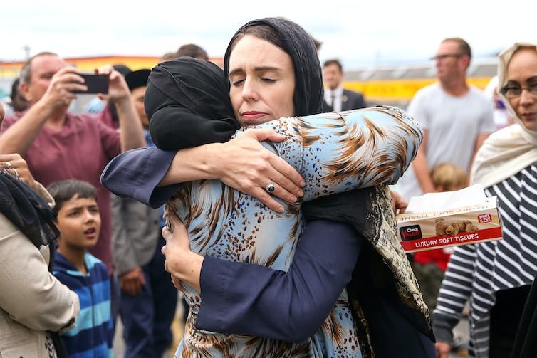 Jacinda Ardern hugging a mosque-goer at the Kilbirnie Mosque Jacinda Ardern hugging a mosque-goer at the Kilbirnie Mosque