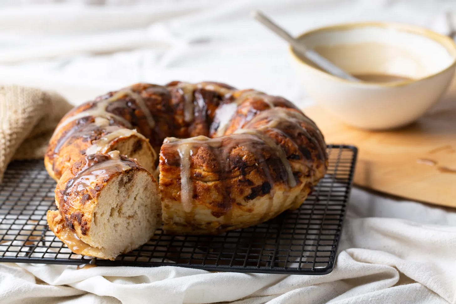 Chef Sam Gowing mixes ingredients for a Hot Cross Bun Cake recipe for Nuttelex in a bright kitchen setting, photographed by Nelly le Comte. Chef Sam Gowing mixes ingredients for a Hot Cross Bun Cake recipe for Nuttelex in a bright kitchen setting, photographed by Nelly le Comte.