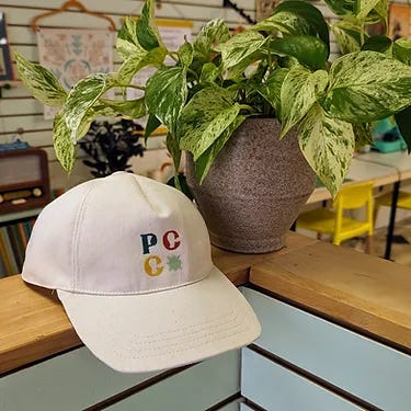 A classic beanie, custom baseball hat, sweatshirt