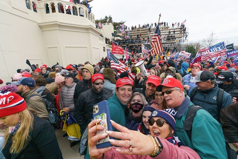 MAGA-capped insurrectionists on January 6th at the Capitol MAGA-capped insurrectionists on January 6th at the Capitol