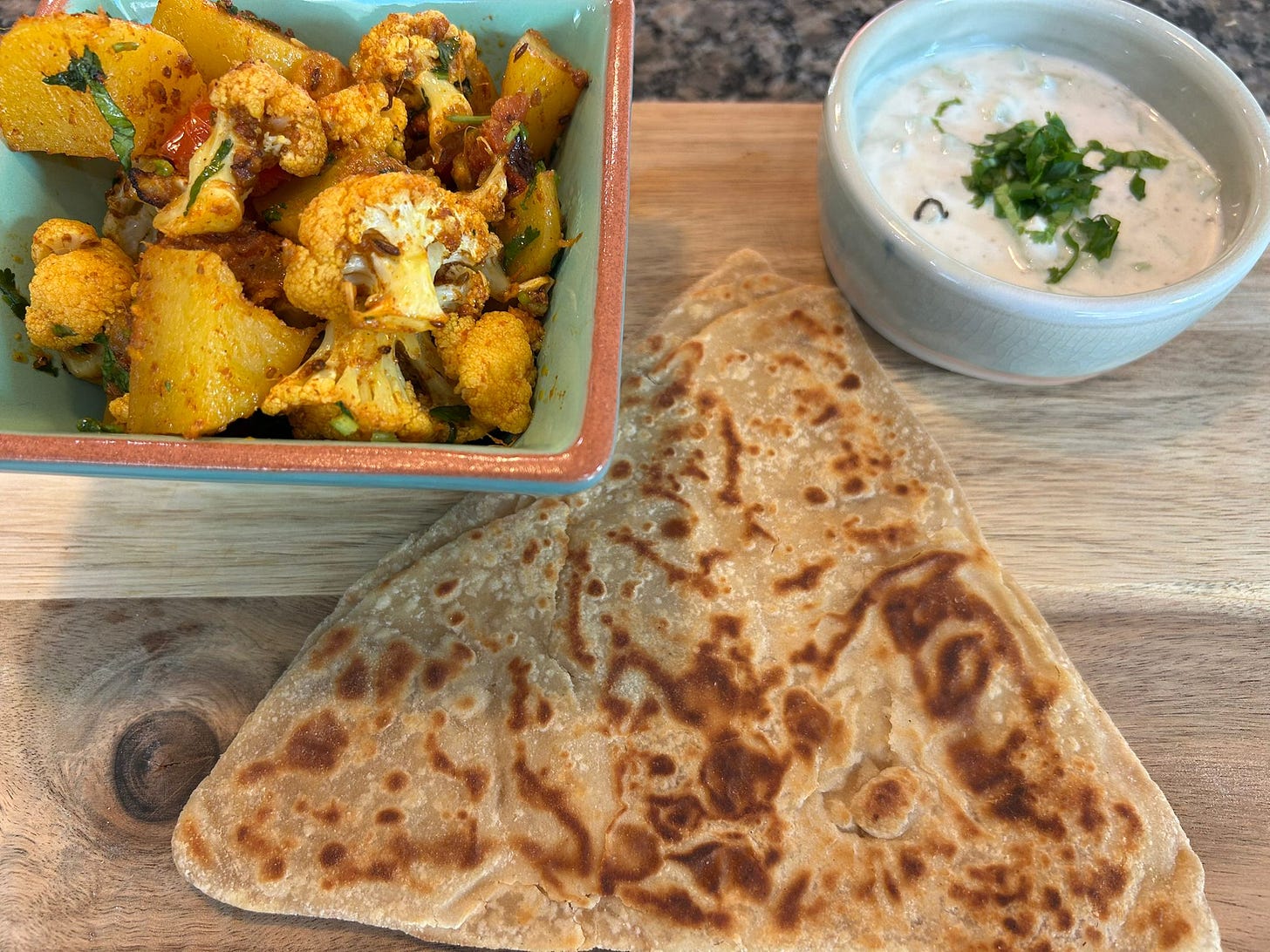 Aloo Gobi, Cucumber raita and Paratha