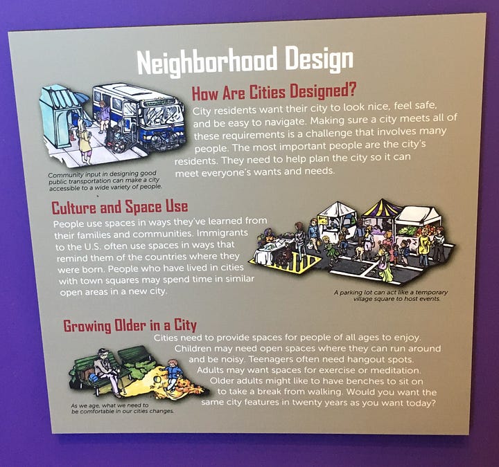 Photos of four signs from the City Science exhibit that give deeper context to exhibit interactives: Neighborhood Design; Director of Traffic (about traffic engineering), City Hot Zones (what causes urban heat islands), and Best Nest (discusses the impact of landscape change on bird biodiversity).
