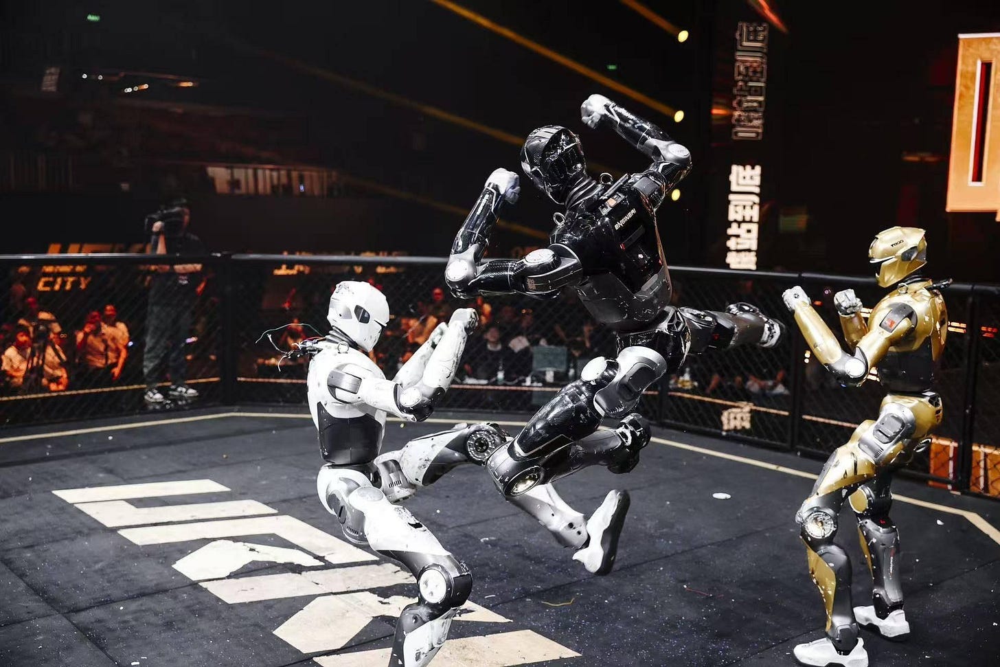 EngineAI's T800s in the cage at the URKL fighting league's Shanghai event, September 19.