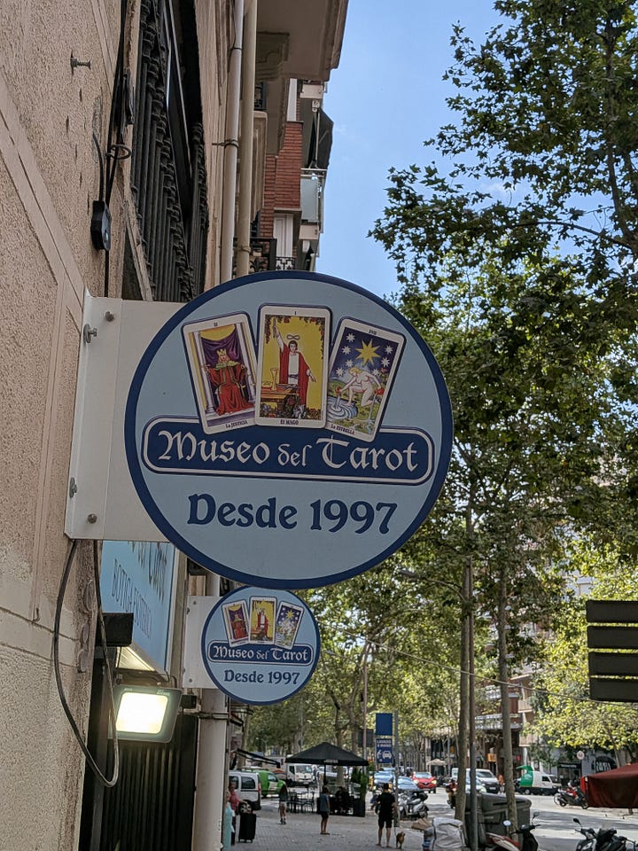 The sign, shop front and interior shots of the hundreds of decks on display in the Museo de Tarot