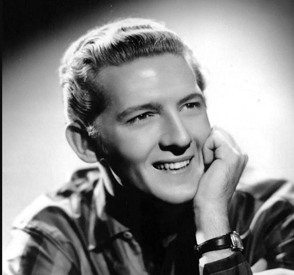 A young Jerry Lee Lewis in a black and white photo A young Jerry Lee Lewis in a black and white photo
