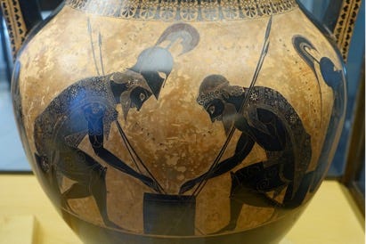 Title: Achilles and Ajax playing dice on a black-figure amphora by Exekias. - Description: Achilles and Ajax playing dice on a black-figure amphora by Exekias. Title: Achilles and Ajax playing dice on a black-figure amphora by Exekias. - Description: Achilles and Ajax playing dice on a black-figure amphora by Exekias.