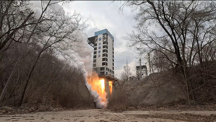 The YF-102V engine and a test second-stage for the reusable Long March 12 undergoing a test firing on March 15th.