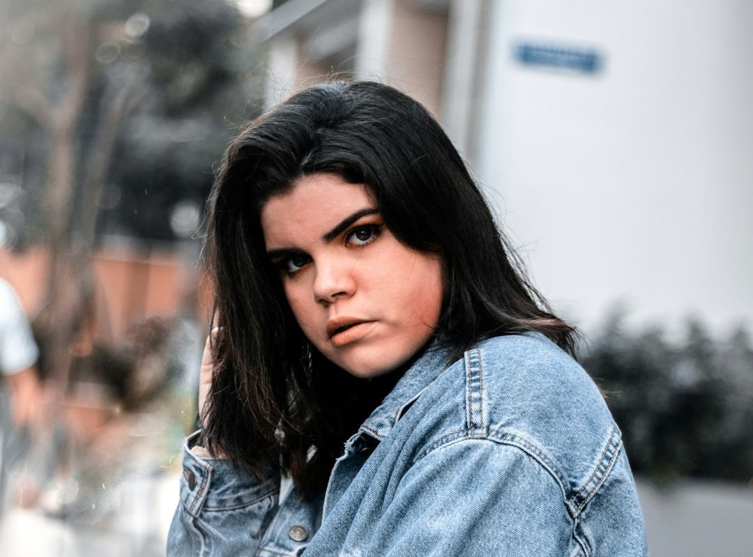 woman in blue denim jacket