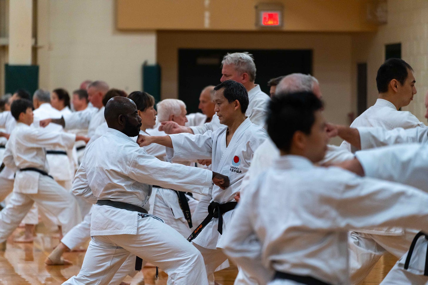 A photo of me in sparring practice at karate training camp in the fall 2024.