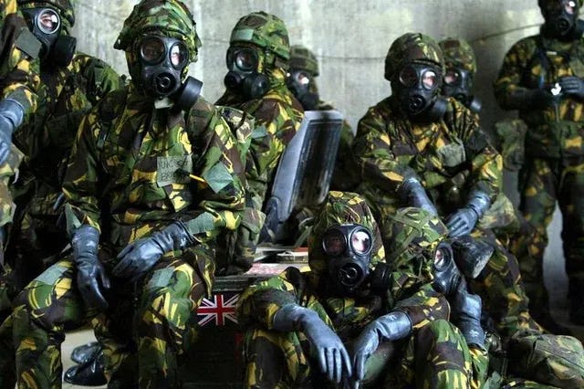 Royal Air Force personnel in full NBC suits await a potential Scud missile attack in a bunker at their base in Kuwait on March 20, 2003, hours before the invasion. Royal Air Force personnel in full NBC suits await a potential Scud missile attack in a bunker at their base in Kuwait on March 20, 2003, hours before the invasion.