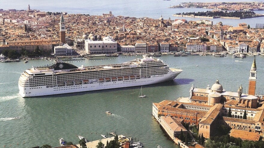 A cruise ship in Venice sails by St. Mark's Square and Doge's Palace. A cruise ship in Venice sails by St. Mark's Square and Doge's Palace.