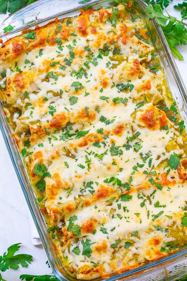 Salsa Verde Chicken Enchiladas in a casserole dish. 