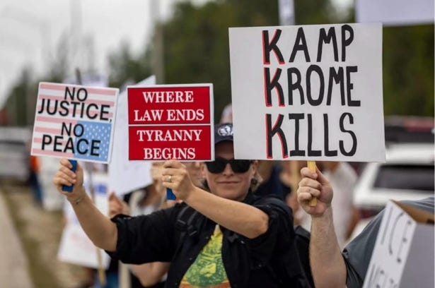 A group of people holding signs
AI-generated content may be incorrect. A group of people holding signs
AI-generated content may be incorrect.