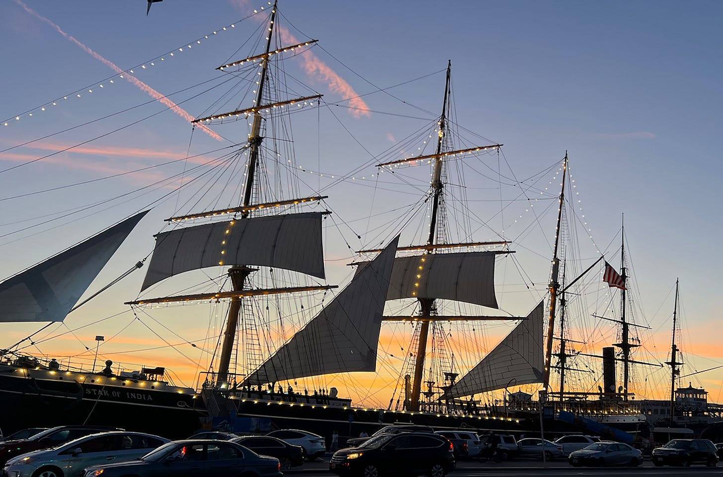 The Star of India ship with three sails backlist by a San Diego sunset