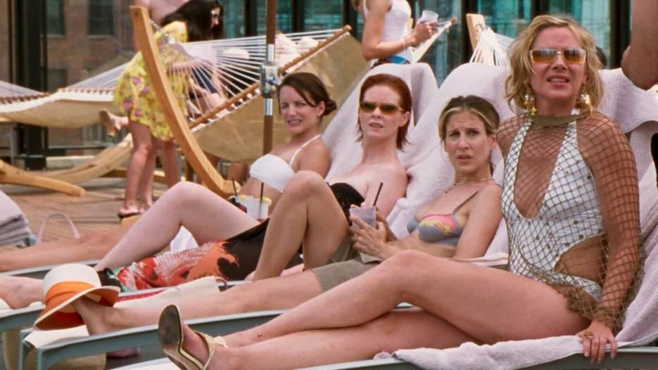 Kristin Davis as Charlotte York, Cynthia Nixon as Miranda Hobbes, Sarah Jessica Parker as Carrie Bradshaw, and Kim Cattrall as Samantha Jones on Sex and the City. Kristin Davis as Charlotte York, Cynthia Nixon as Miranda Hobbes, Sarah Jessica Parker as Carrie Bradshaw, and Kim Cattrall as Samantha Jones on Sex and the City.