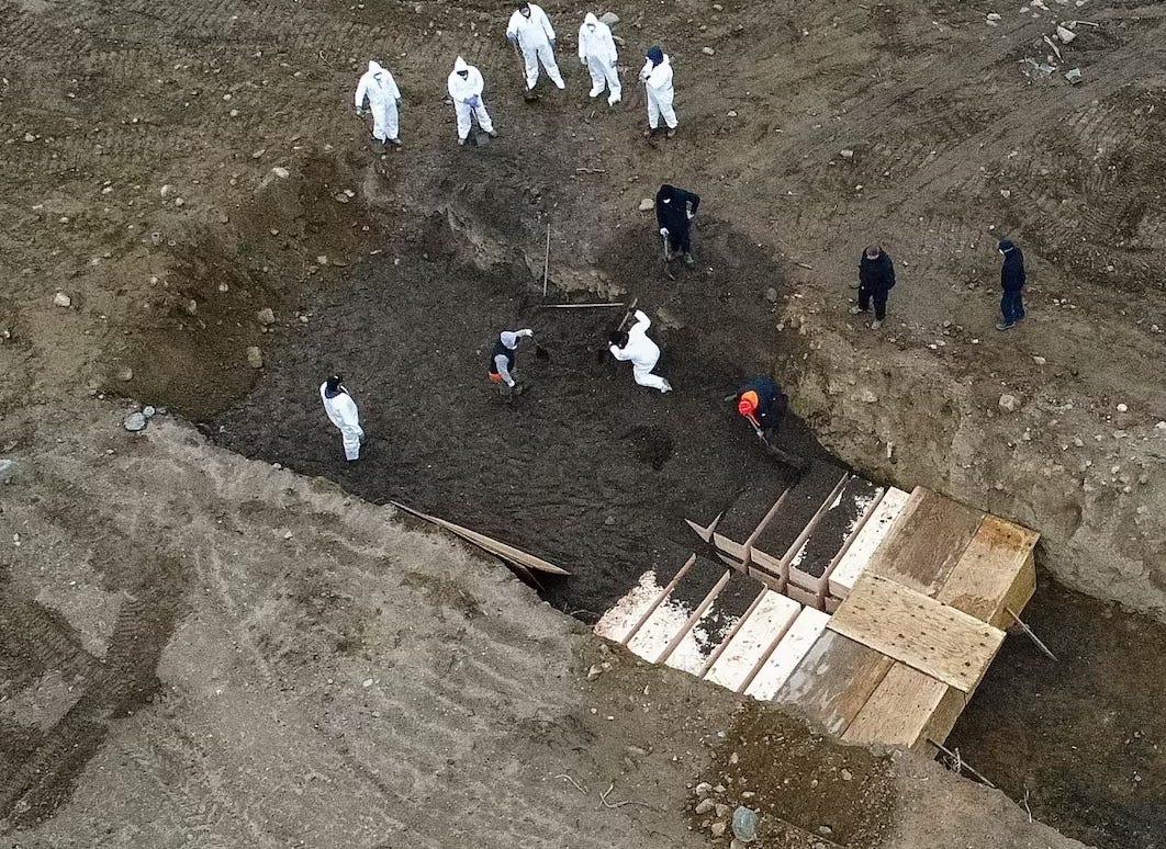 NYC March 2020 photo of a mass COVID grave dug on Hart Island