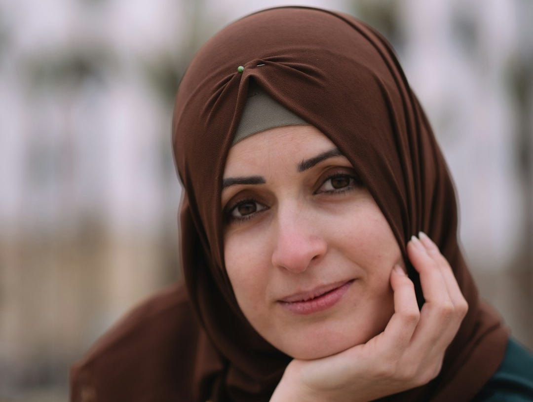a woman wearing a head scarf
