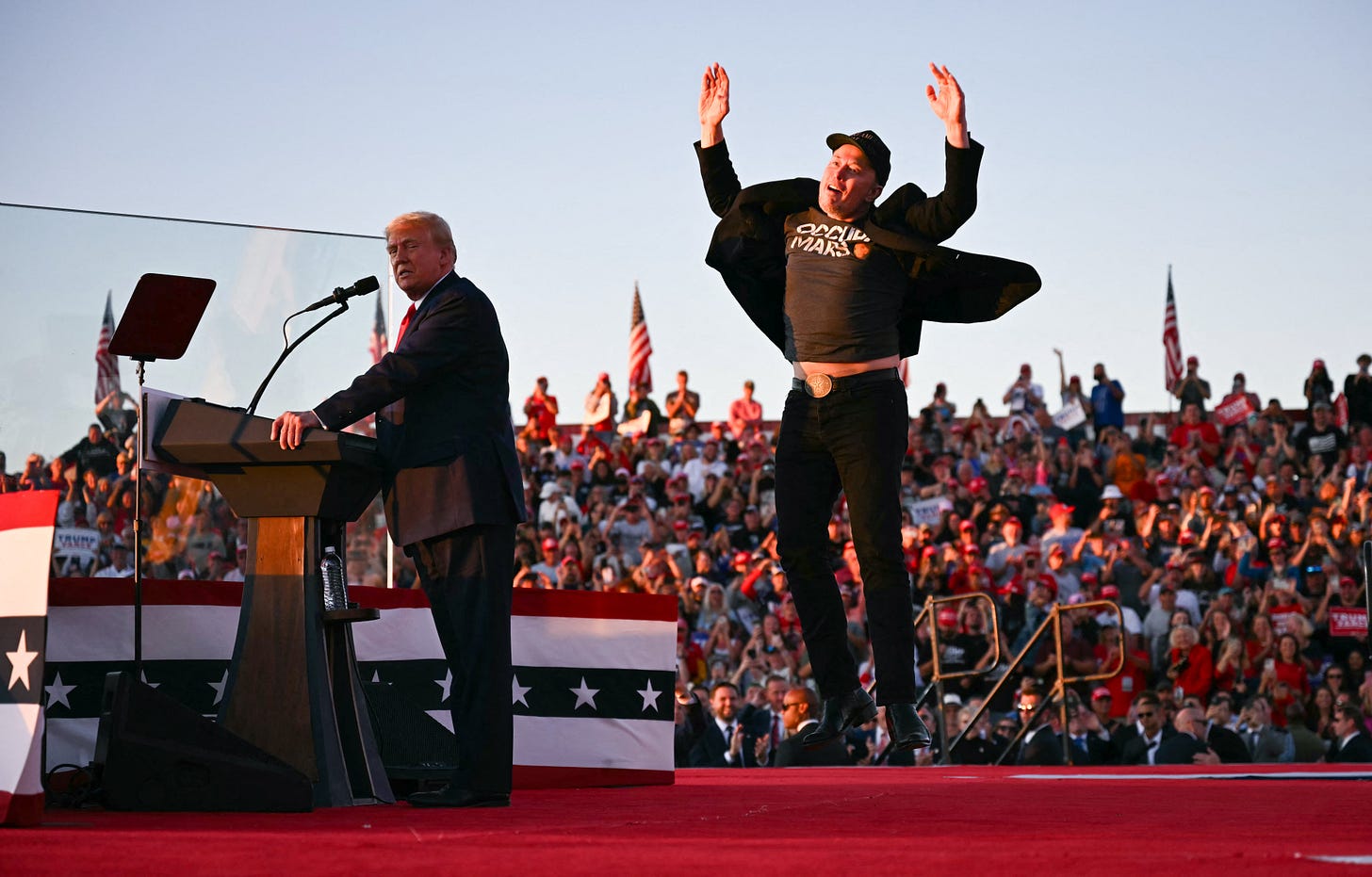 Elon Musk's jumping on stage photo from Trump's rally has ...