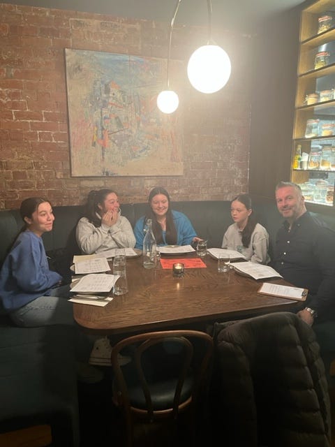Image By Author - Family In A Booth
