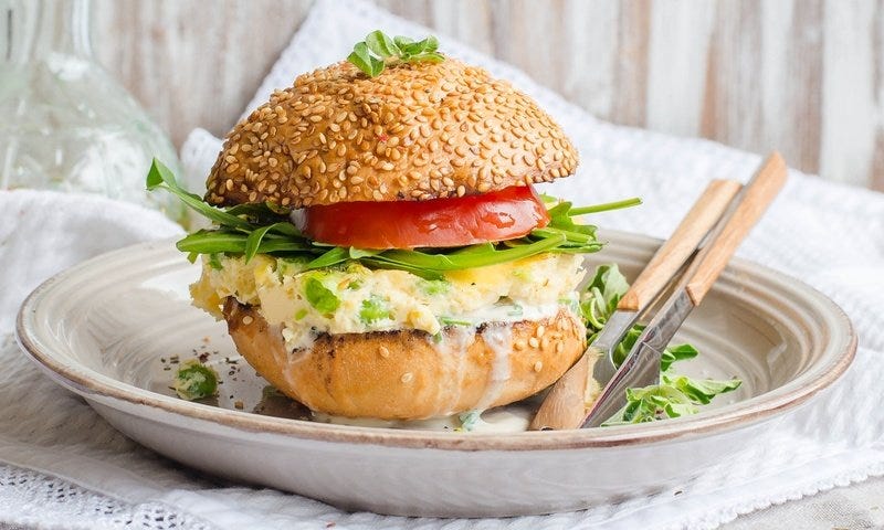Burgers with mushrooms, onions, tomatoes and cheese