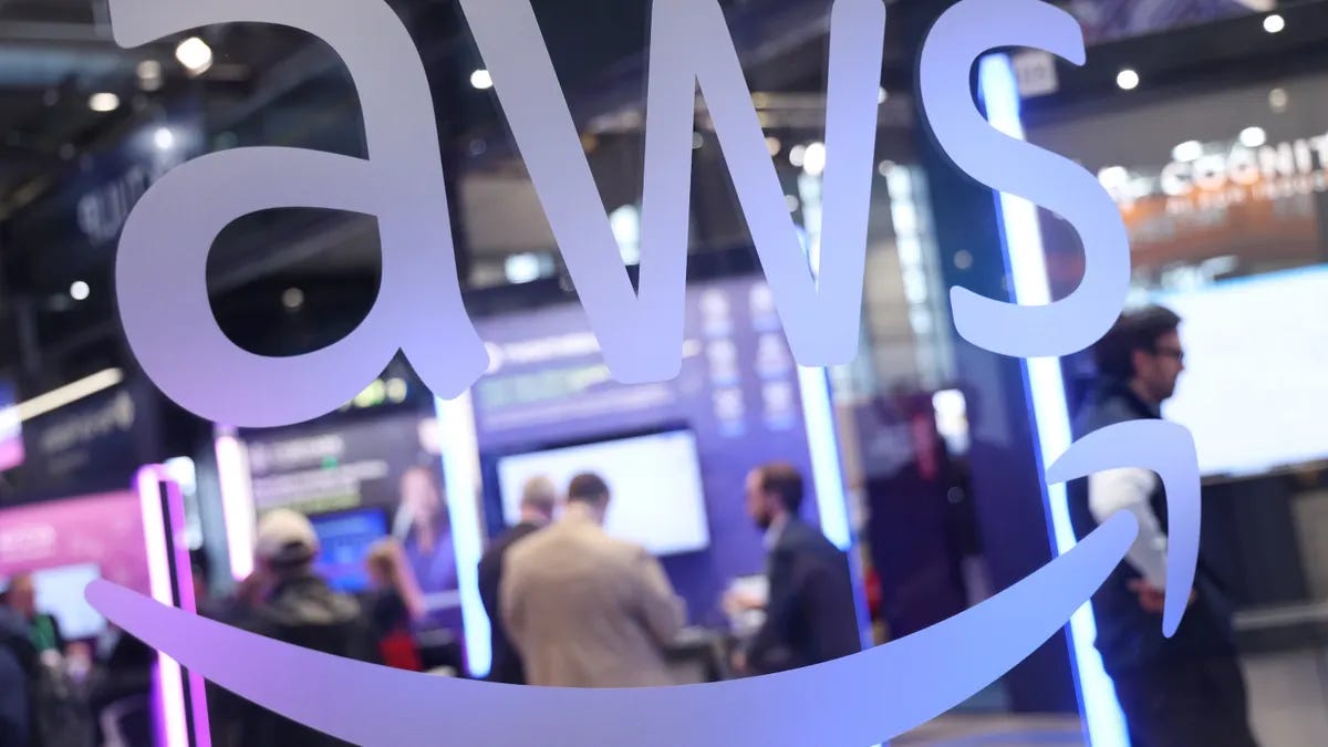 The AWS Amazon Web Services pavilion stands are seen at the 2025 Hannover Messe industrial trade fair on March 31, 2025 in Hanover, Germany. The AWS Amazon Web Services pavilion stands are seen at the 2025 Hannover Messe industrial trade fair on March 31, 2025 in Hanover, Germany.