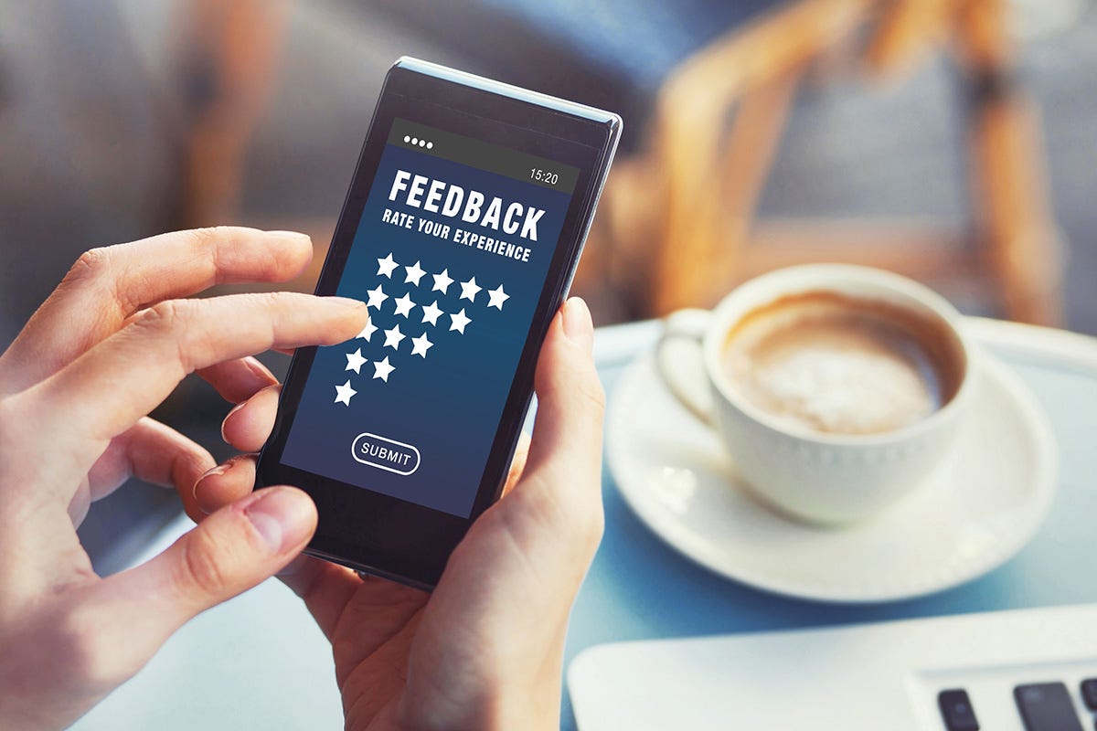 A person holding a phone

Description automatically generated with low confidence